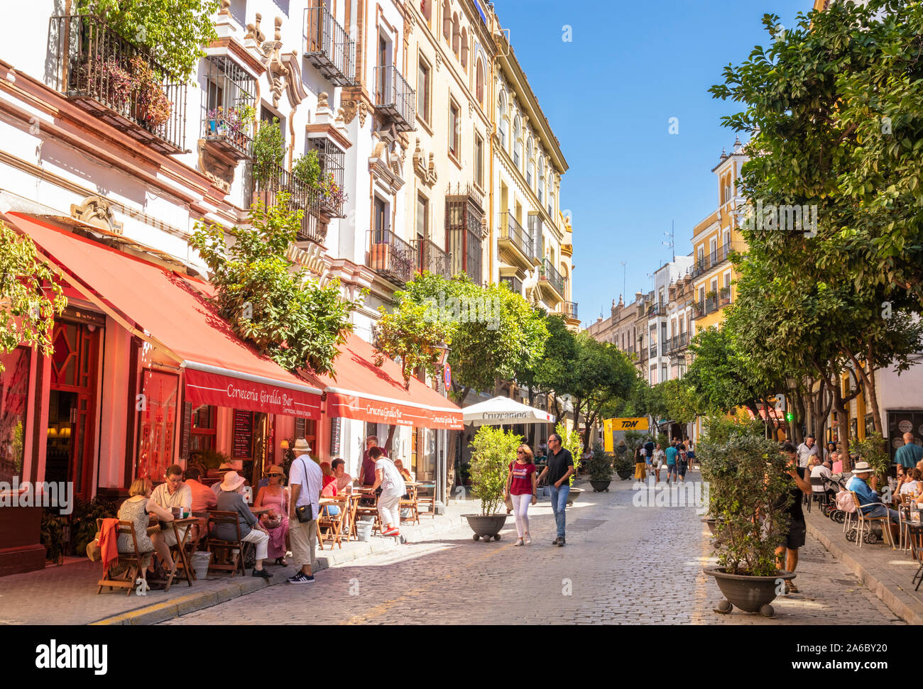 Seville Calle Mateos Gago Street, people eating outside cafes and restaurants Seville centre Sevilla Seville Spain Seville Andalusia Spain EU Europe08 Stock Photo