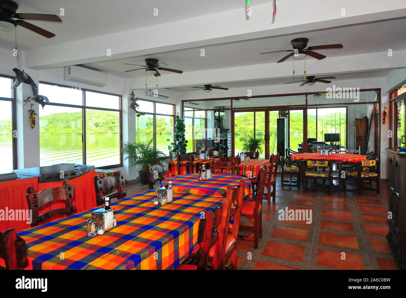 The Anglers Inn Resort facilities at Lake Picachos in Mexico's Sierra Madre Mountains include a restaurant, bar, lounge area, boat docks and cabins. Stock Photo