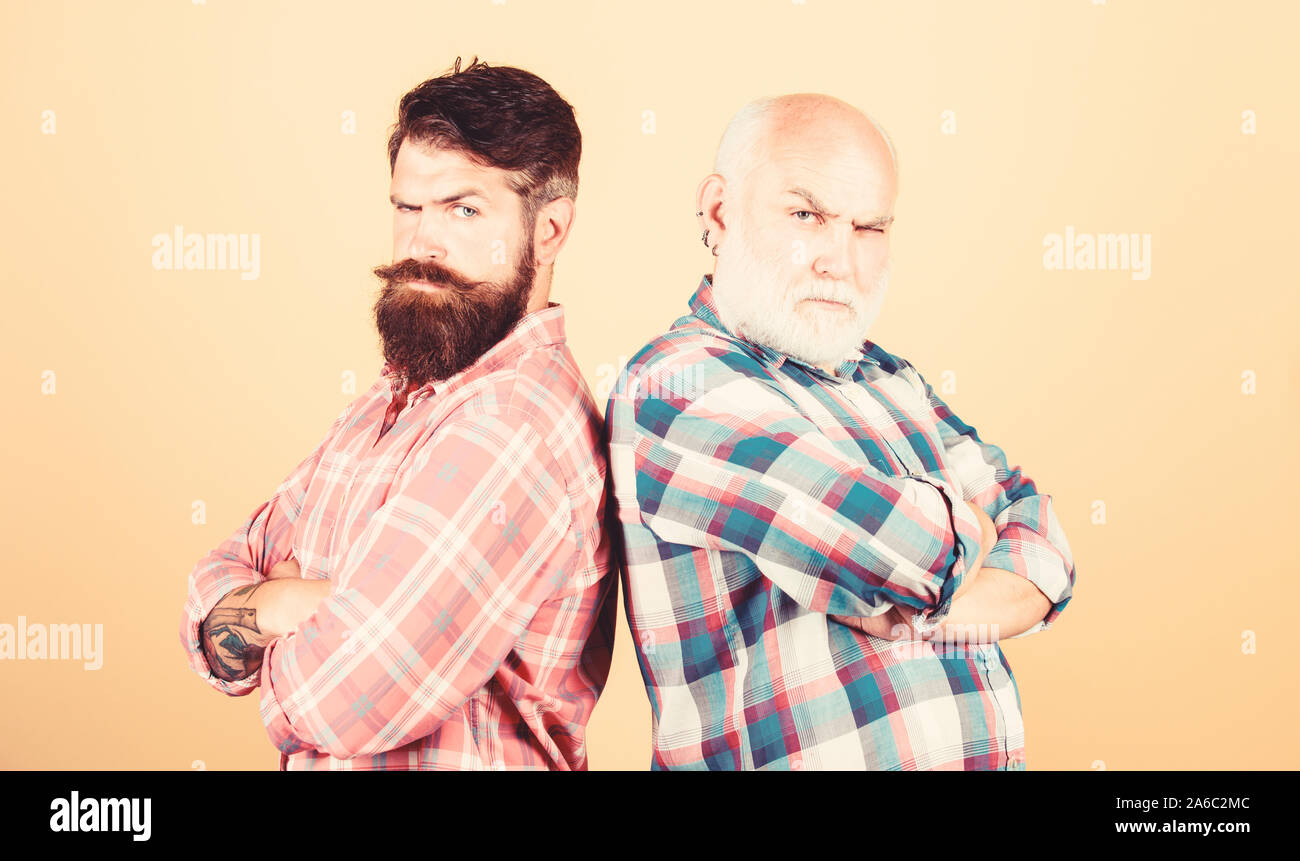 Bearded friends. Barbershop concept. Men bearded hipster stand back to ...