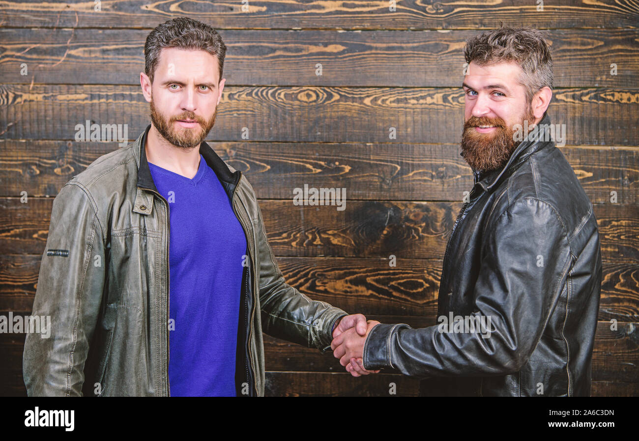 Friendship of brutal guys. Approved business deal. Handshake gesture