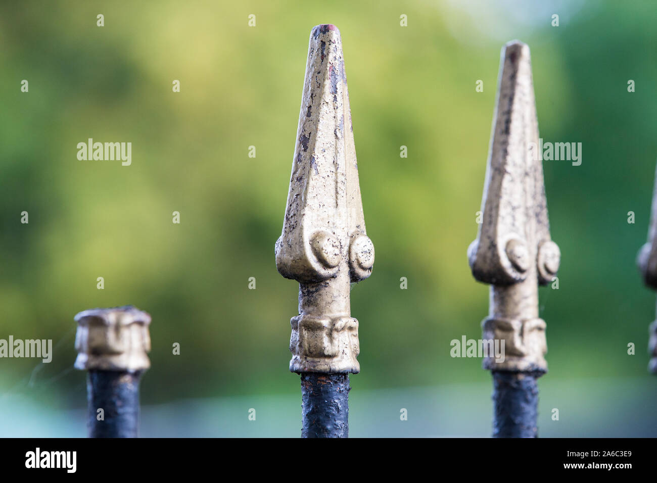 Tops of railings. Two spear shaped railing heads. Stock Photo