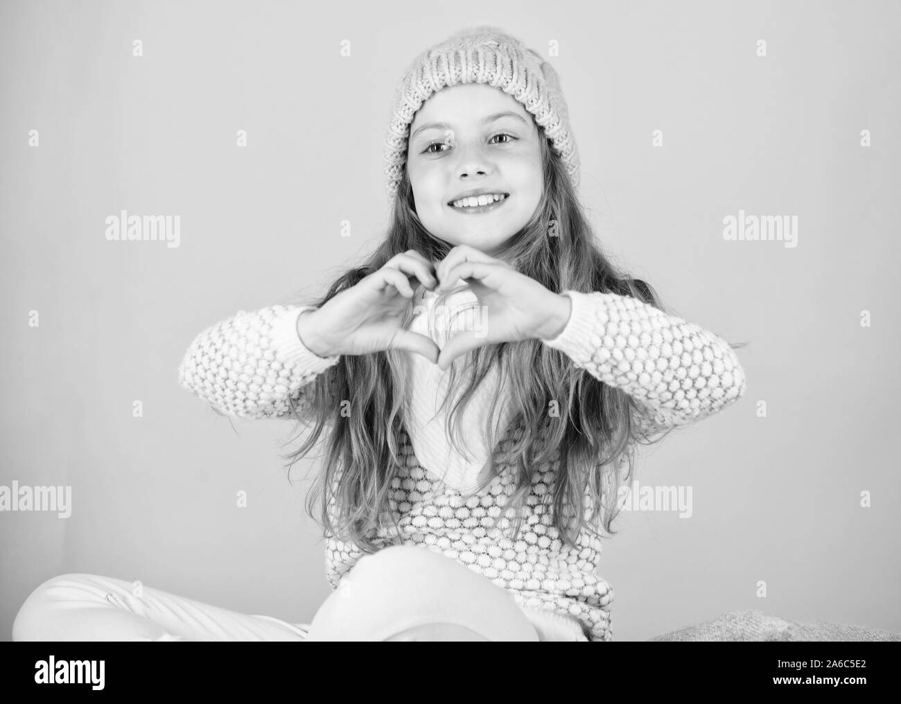 Child Long Hair Smiling Show Heart Gesture Girl Wear Knitted Hat