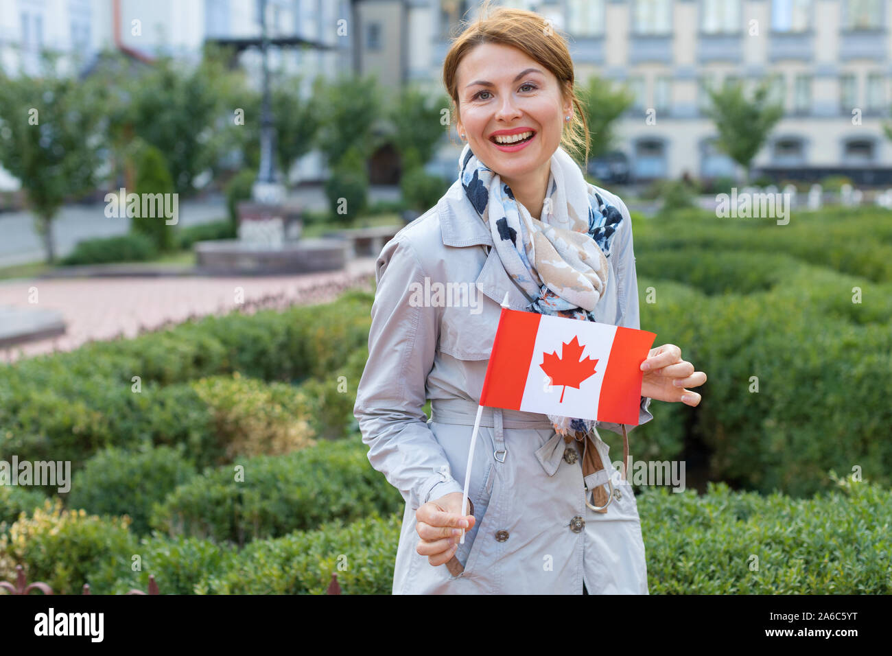 Adult woman canada flag hi-res stock photography and images - Alamy