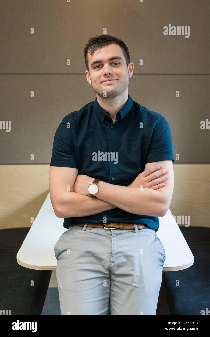 Posed portrait of an office worker looking happy and natural Stock Photo