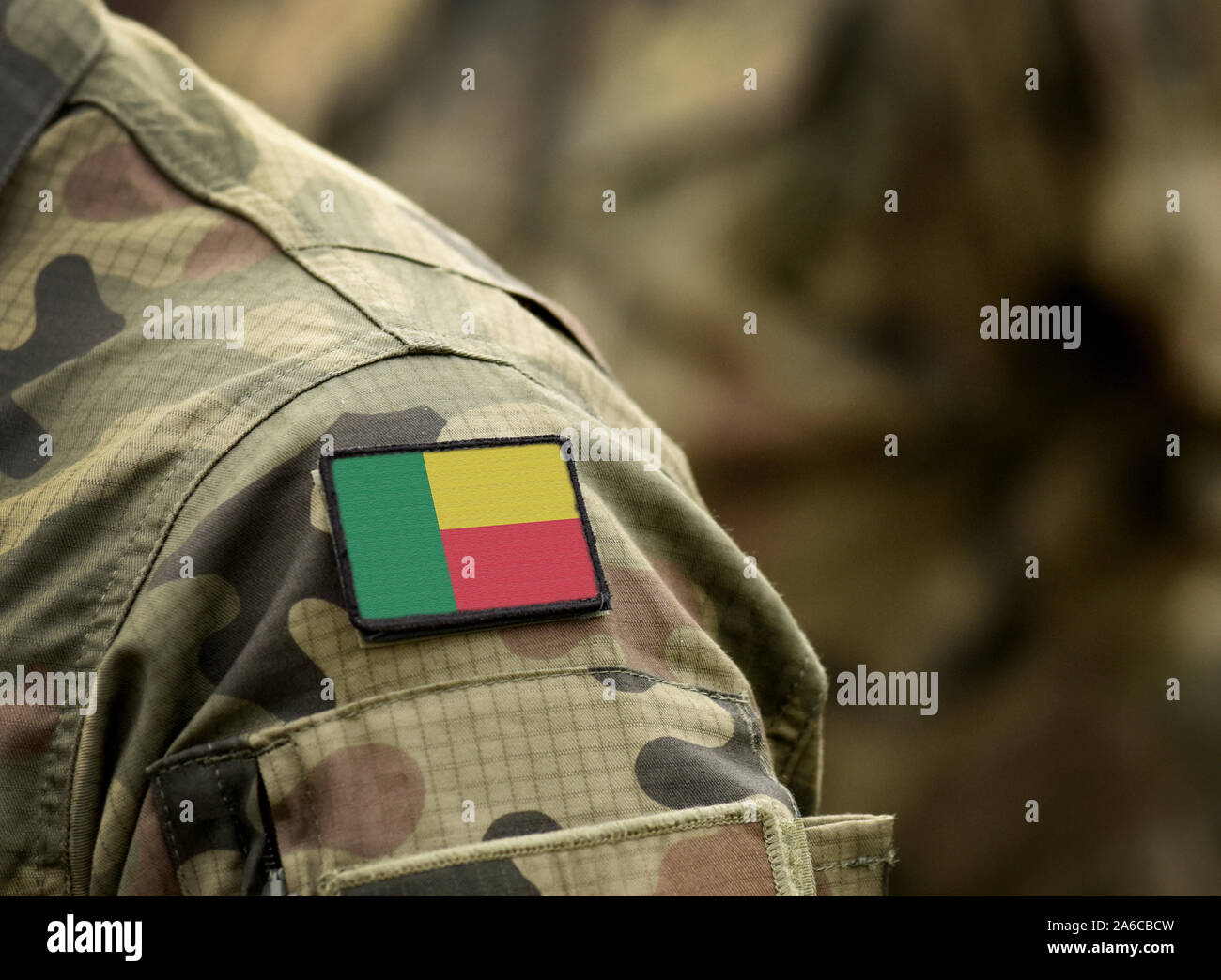 Flag of Benin on military uniform. Army, troops, soldiers, Africa, (collage). Stock Photo