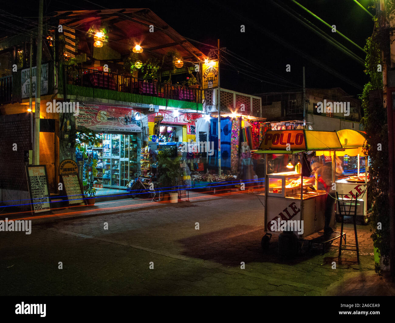 main street at night in Panajachel, Guatemala Stock Photo
