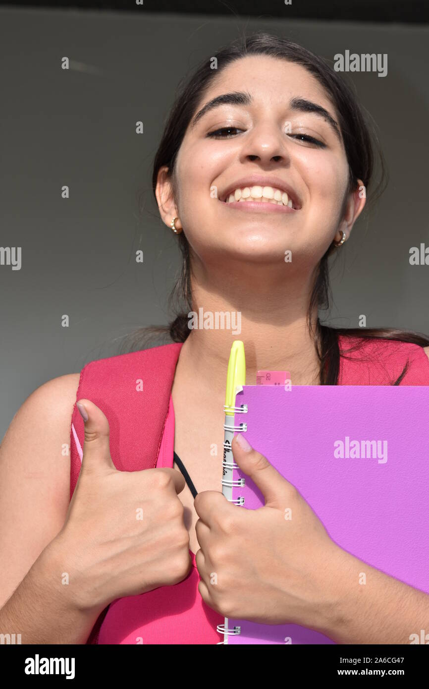 Beautiful Girl Student With Thumbs Up Stock Photo - Alamy