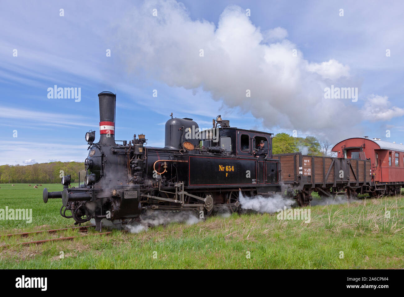 The historic steam train Angelner Dampfeisenbahn in Schleswig-Holstein, Germany. Stock Photo