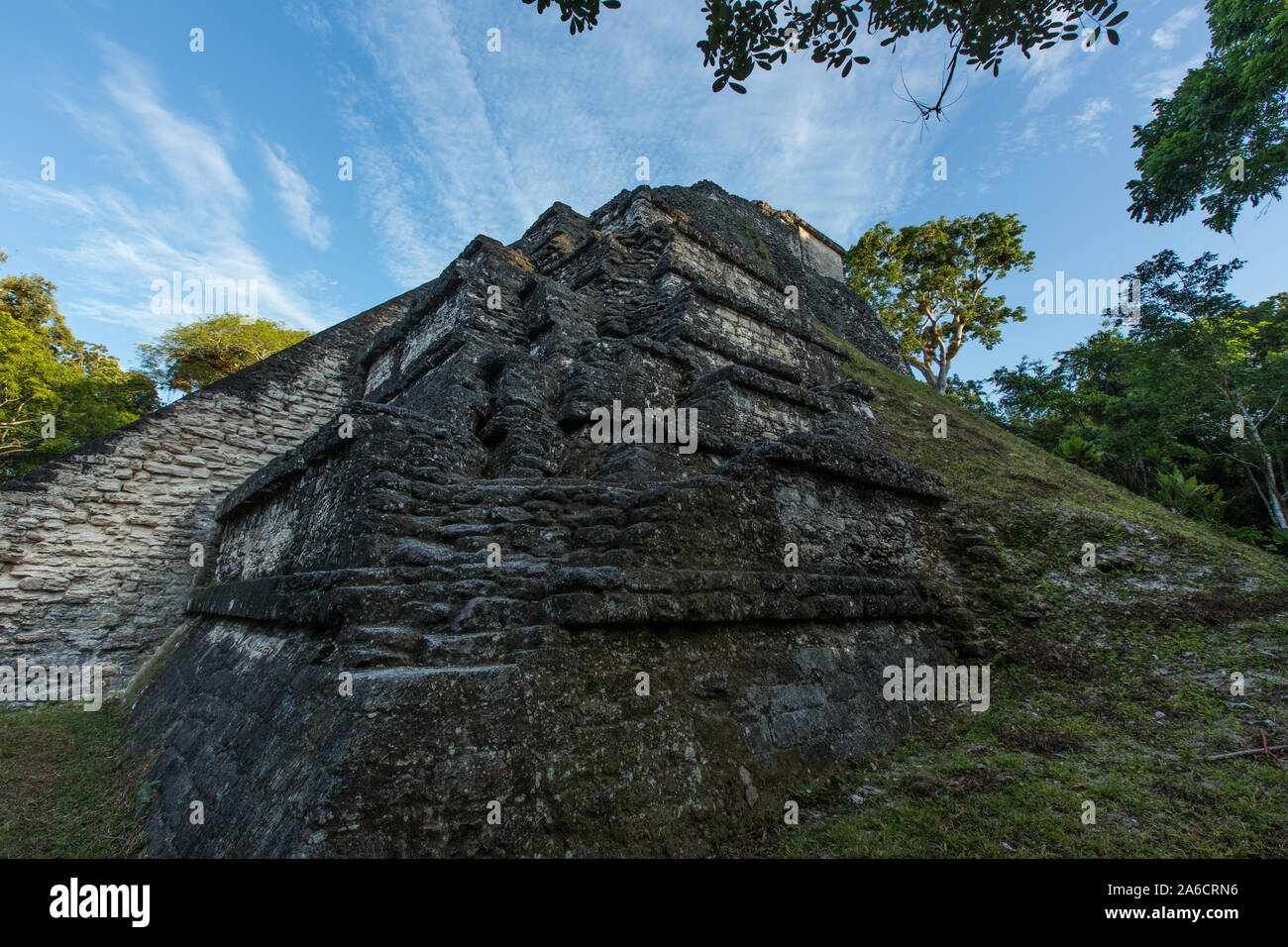Partially-restored Mayan civilization ruins at Tikal National Park, Guatemala, a UNESCO World Heritage site.  Mundo Perdido or Lost World complex.  Th Stock Photo