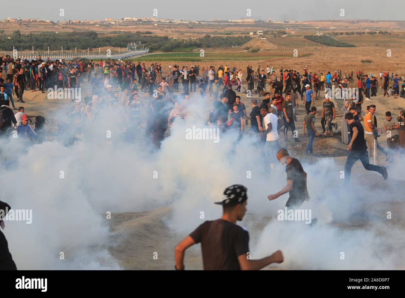 Al-Buraj Refugee Camp, The Gaza Strip, Palestine. 25th Oct, 2019. Clashes between Palestinians and Israeli troops east al-Buraj refugee camp in central of the Gaza Strip. Palestinian protesters were shot and injured with Israeli live ammunition, during the protest. Credit: Mahmoud Khattab/Quds Net News/ZUMA Wire/Alamy Live News Stock Photo