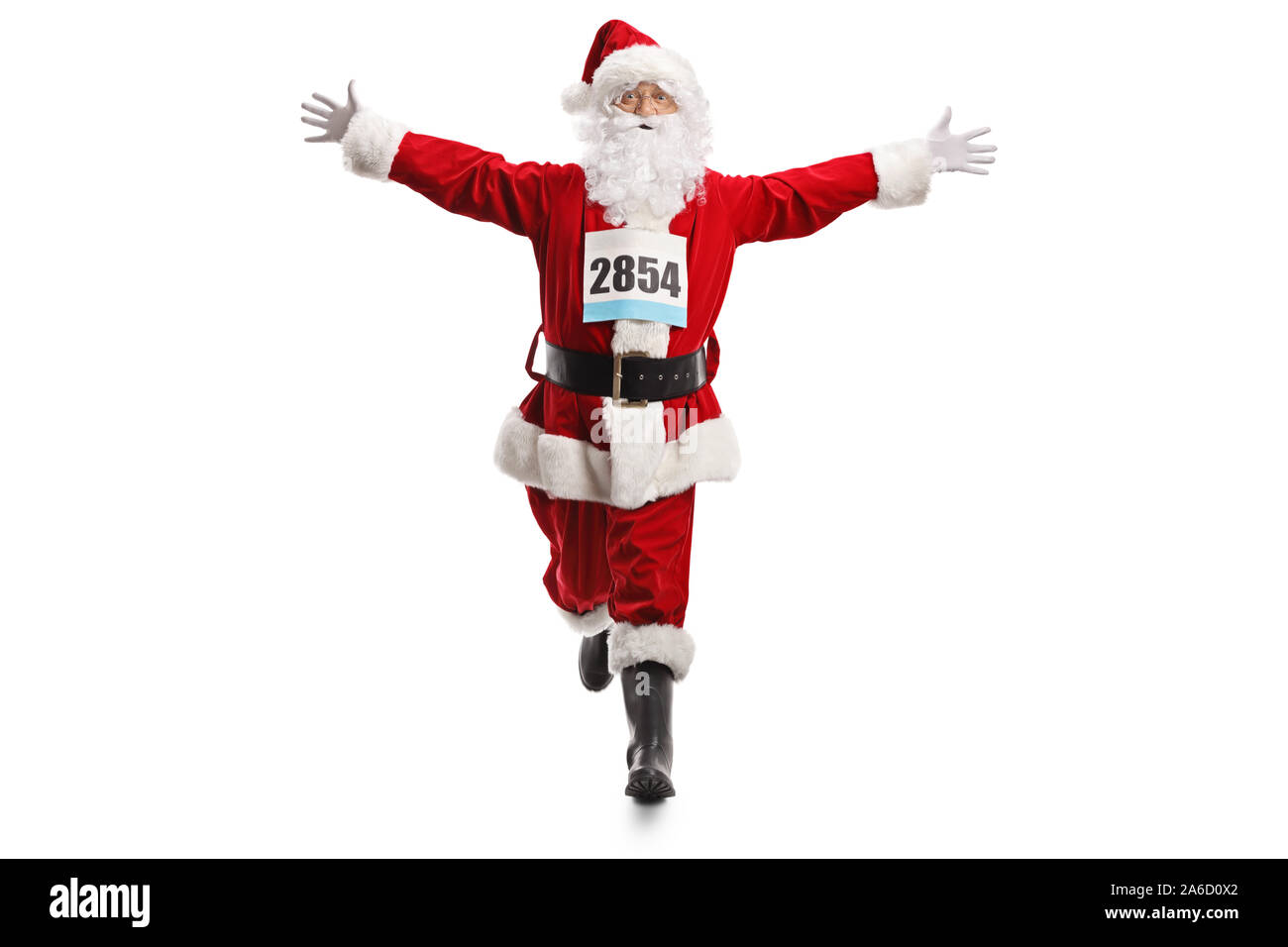 Full length portrait of Santa Claus running with a race number an spreading arms isolated on white background Stock Photo