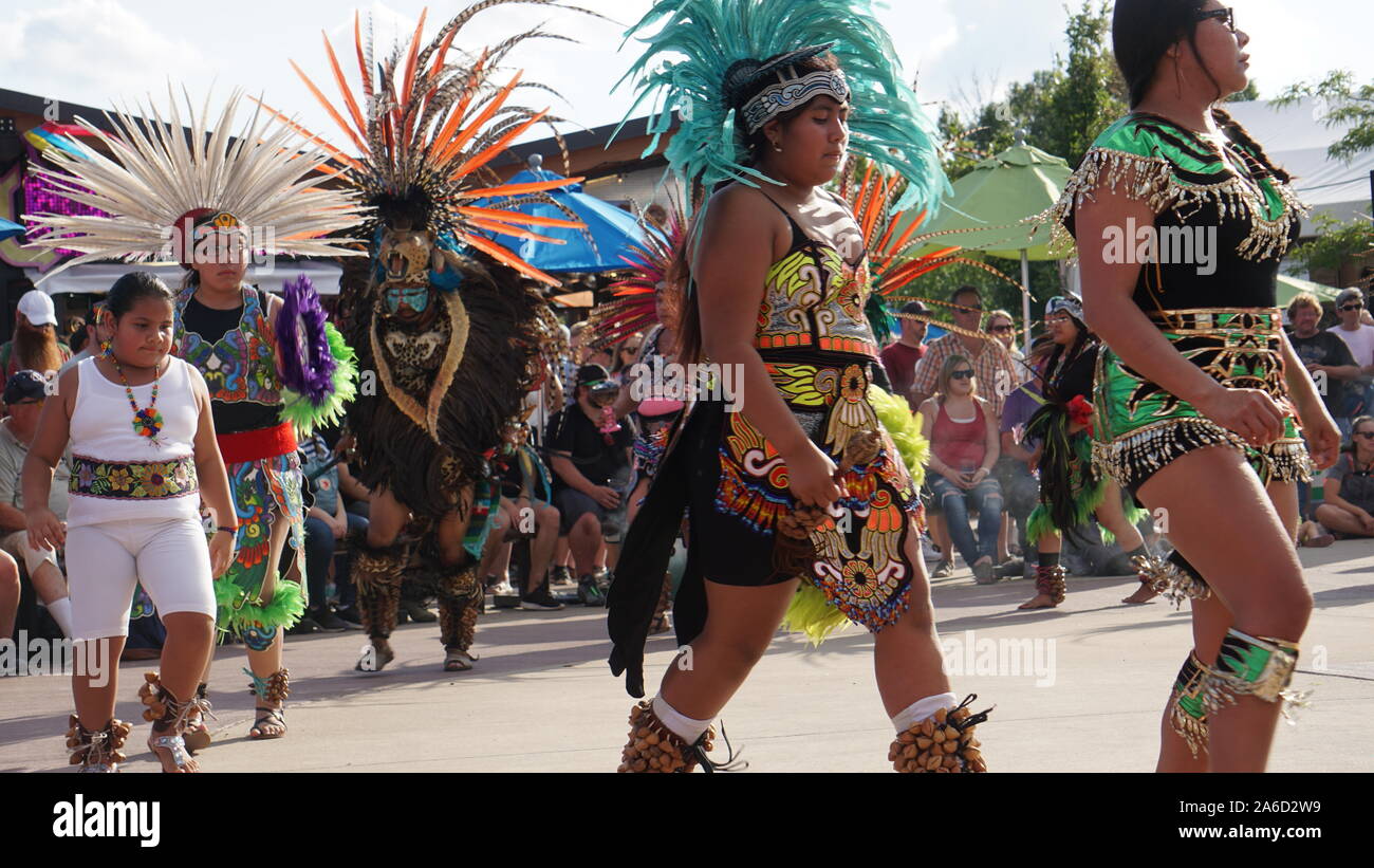 Mexica Yolotl, a Minneapolis-based traditional Aztec dance group that celebrates pre-Hispanic heritage performing at the Minnesota State Fair. Stock Photo