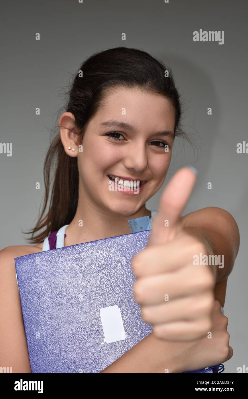 Female Student With Thumbs Up Stock Photo - Alamy