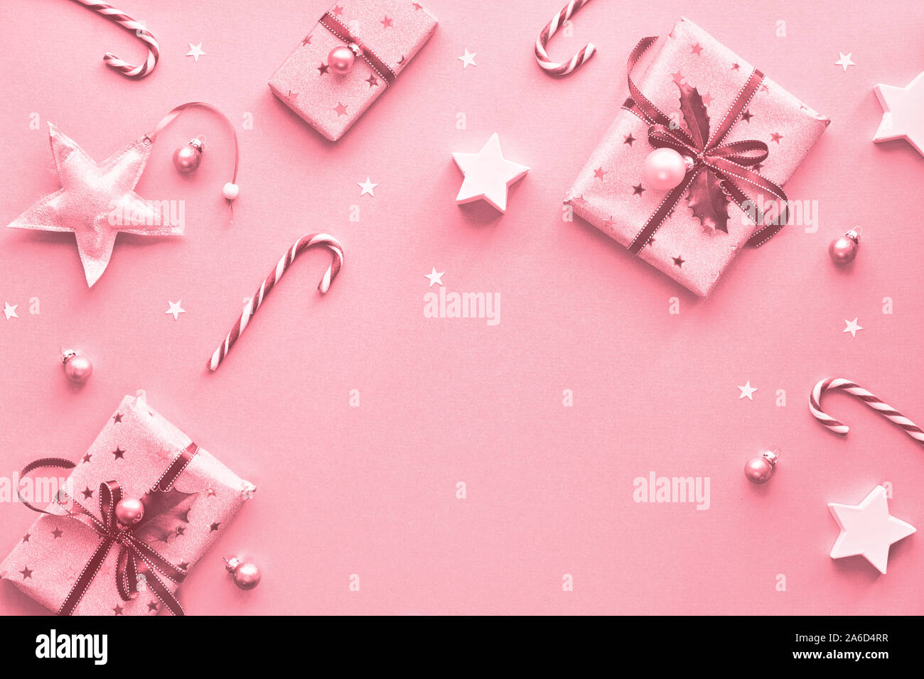 Festive monochrome pink Christmas background with pink gift boxes ...