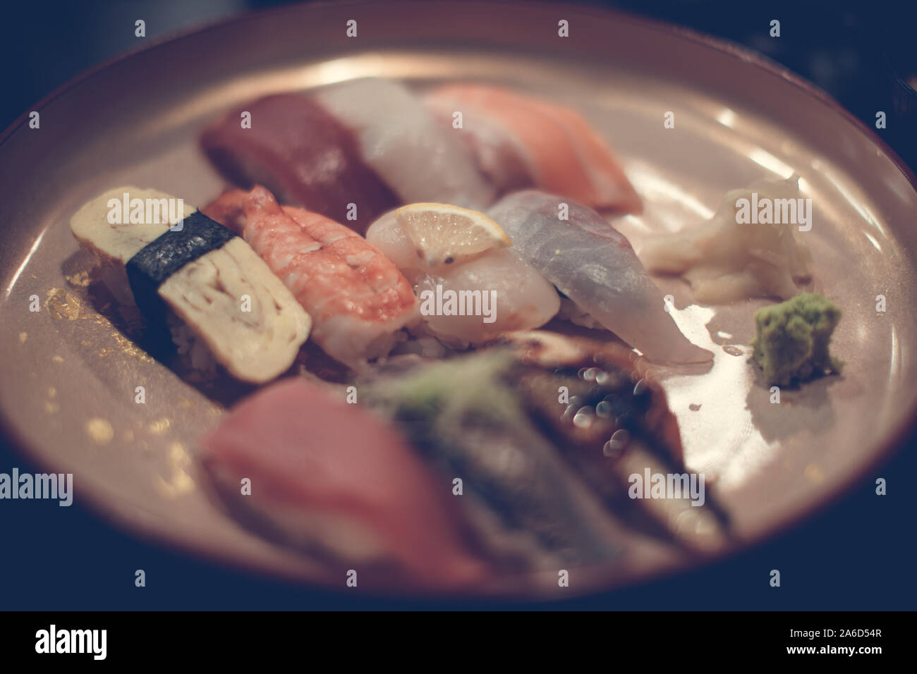 Japanese cuisine, close up of sashimi sushi set with vintage filter Stock Photo
