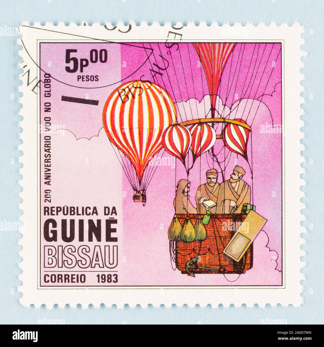Close up of 1983 postage stamp from Guinea Bissau celebrating 200th anniversary of first untethered manned hot air balloon flight. Stock Photo