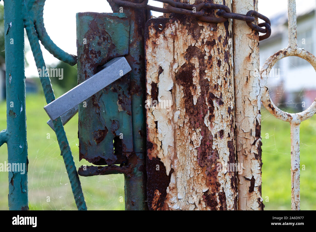 And old rusty iron handle, lock and chain Stock Photo