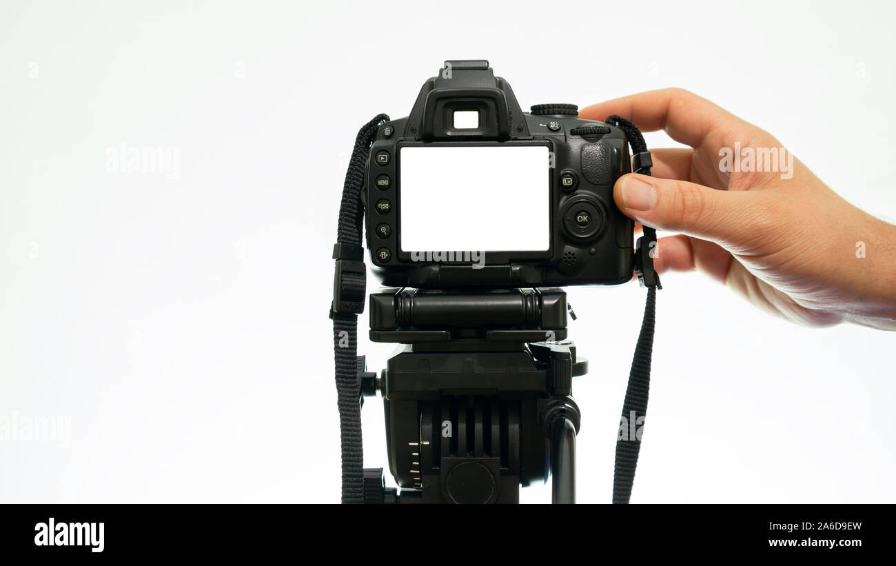 Hand taking pictures with a DSLR camera. mockup camera view Stock Photo -  Alamy