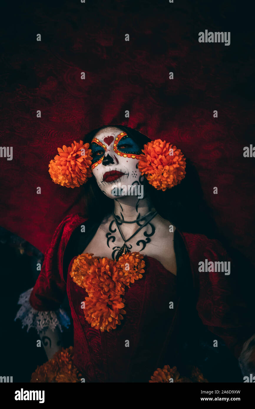 Actress in full gown and makeup, representing a Catrina (wealthy dead woman figure) for the Dia de los Muertos Celebration in Mexico City. Stock Photo