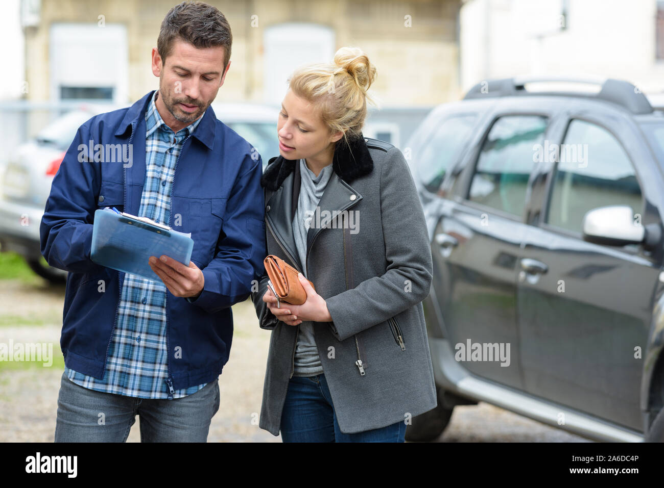 talking about insurance after accident Stock Photo Alamy
