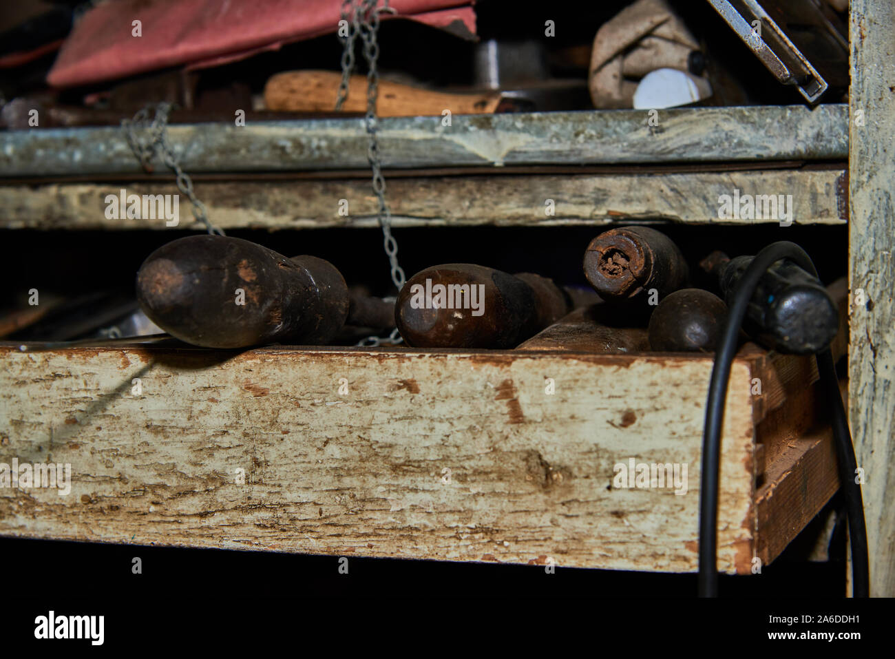 Old rusty tools on the garage rack claoseup Stock Photo