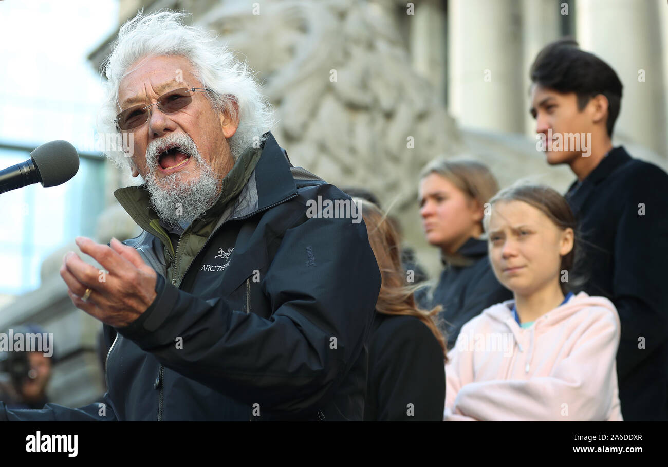 Swedish teen activist Greta Thunberg (pink) listens to David Suzuki speak after arriving for the post federal election Friday climate strike march starting and ending at the Vancouver Art Gallery in Vancouver, British Columbia on October 25, 2019. Organized by local youth-led, Sustainabiliteens, Greta and a turn out of nearly 10,000 climate activists demand action from industry and the various levels of government and are supporting the 15-youth who announced their plans to sue the federal government alleging it has contributed to climate change. Photo by Heinz Ruckemann/UPI Stock Photo