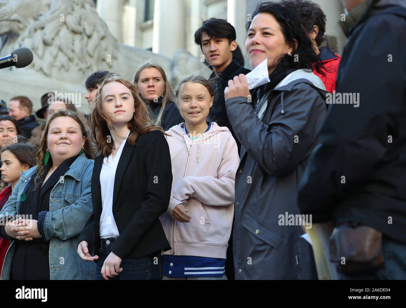 Swedish teen activist Greta Thunberg (pink) arrives for the post federal election Friday climate strike march starting and ending at the Vancouver Art Gallery in Vancouver, British Columbia on October 25, 2019. Organized by local youth-led, Sustainabiliteens, Greta and a turn out of nearly 10,000 climate activists demand action from industry and the various levels of government and are supporting the 15-youth who announced their plans to sue the federal government alleging it has contributed to climate change. Photo by Heinz Ruckemann/UPI Stock Photo