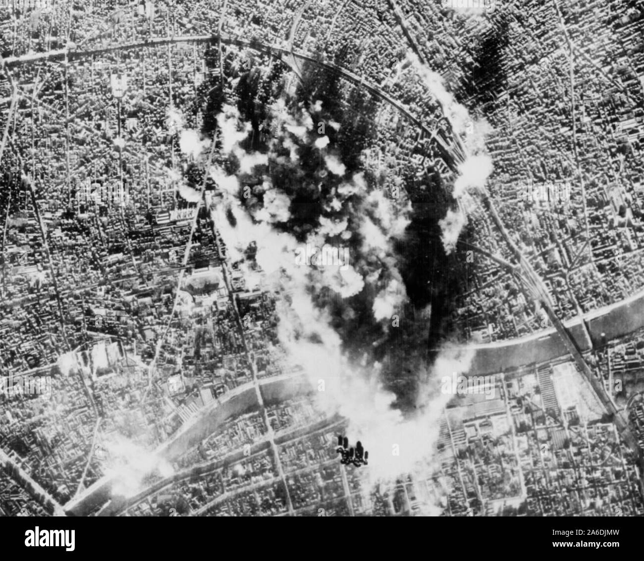 Photograph made from B-17 Flying Fortress of the 8th AAF Bomber Command on 31 Dec. when they attacked the vital CAM ball- bearing plant and the nearby Hispano Suiza aircraft engine repair depot in Paris. France, 1943 Stock Photo