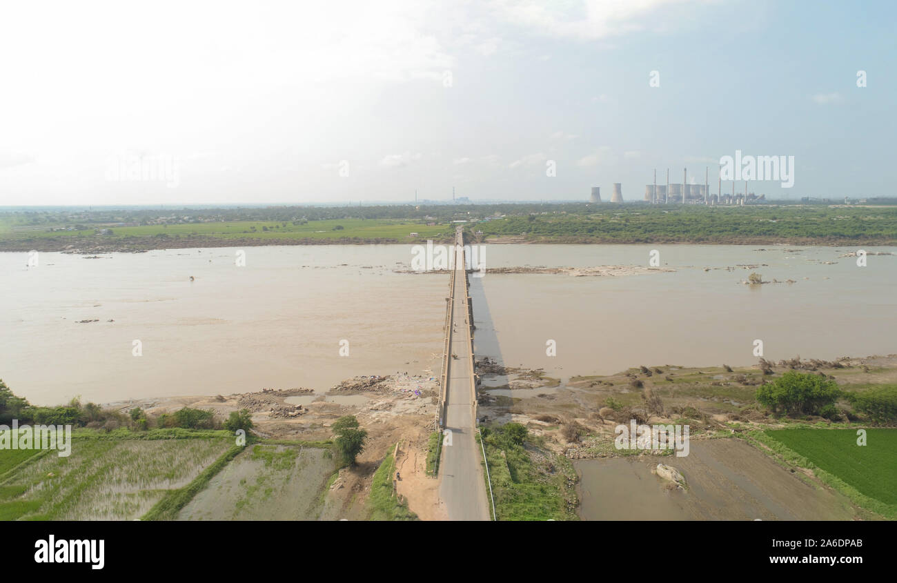Aerial View of Bridge above the Krishna river near raichur thermal coal power plant, India. Stock Photo