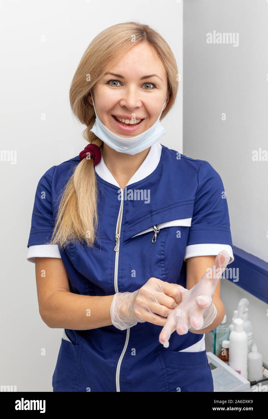 doctor wears white latex medical gloves Stock Photo Alamy