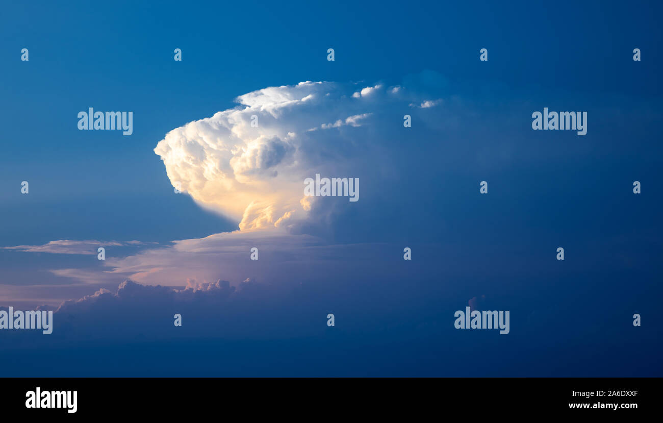 dark blue sky with a cloud Stock Photo - Alamy