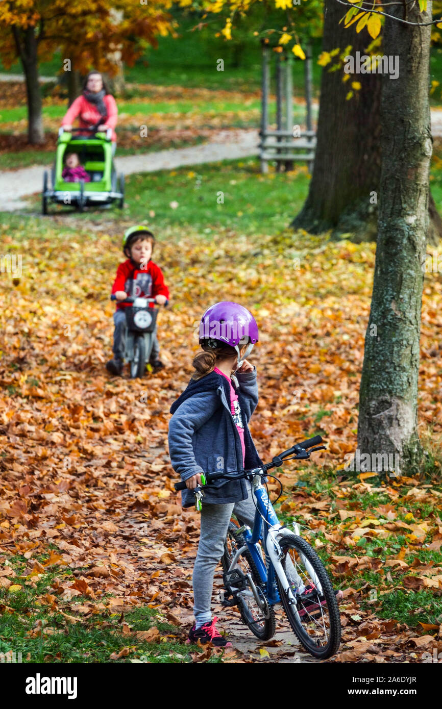 Children riding bike helmet hi-res stock photography and images - Alamy