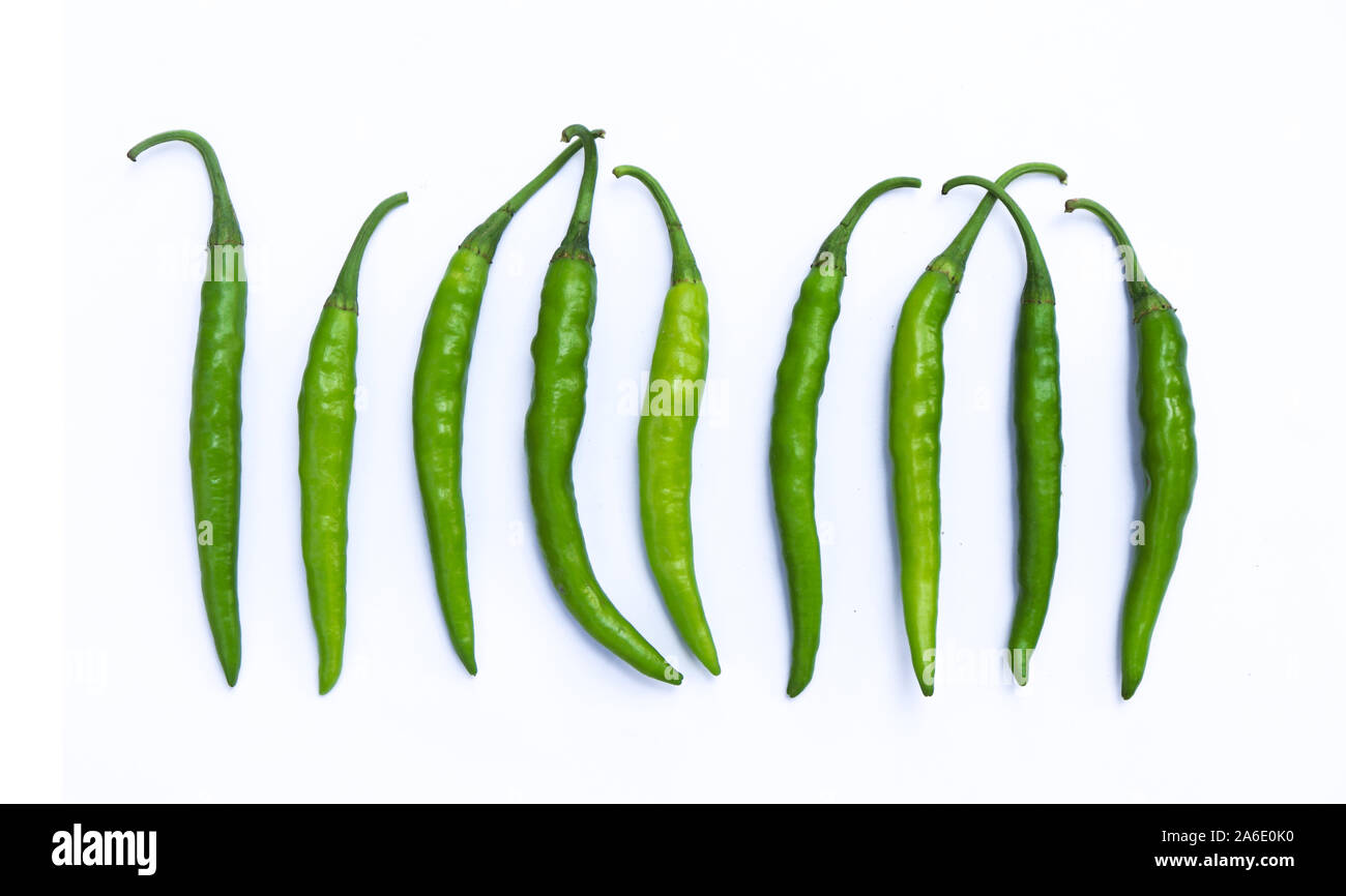 Green chili peppers isolated on white background Stock Photo - Alamy