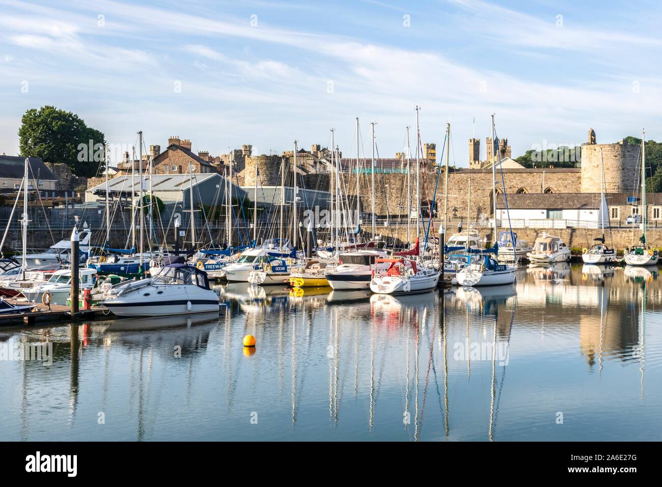 Victoria dock with Caernarfon Castle in the background Stock Photo Alamy