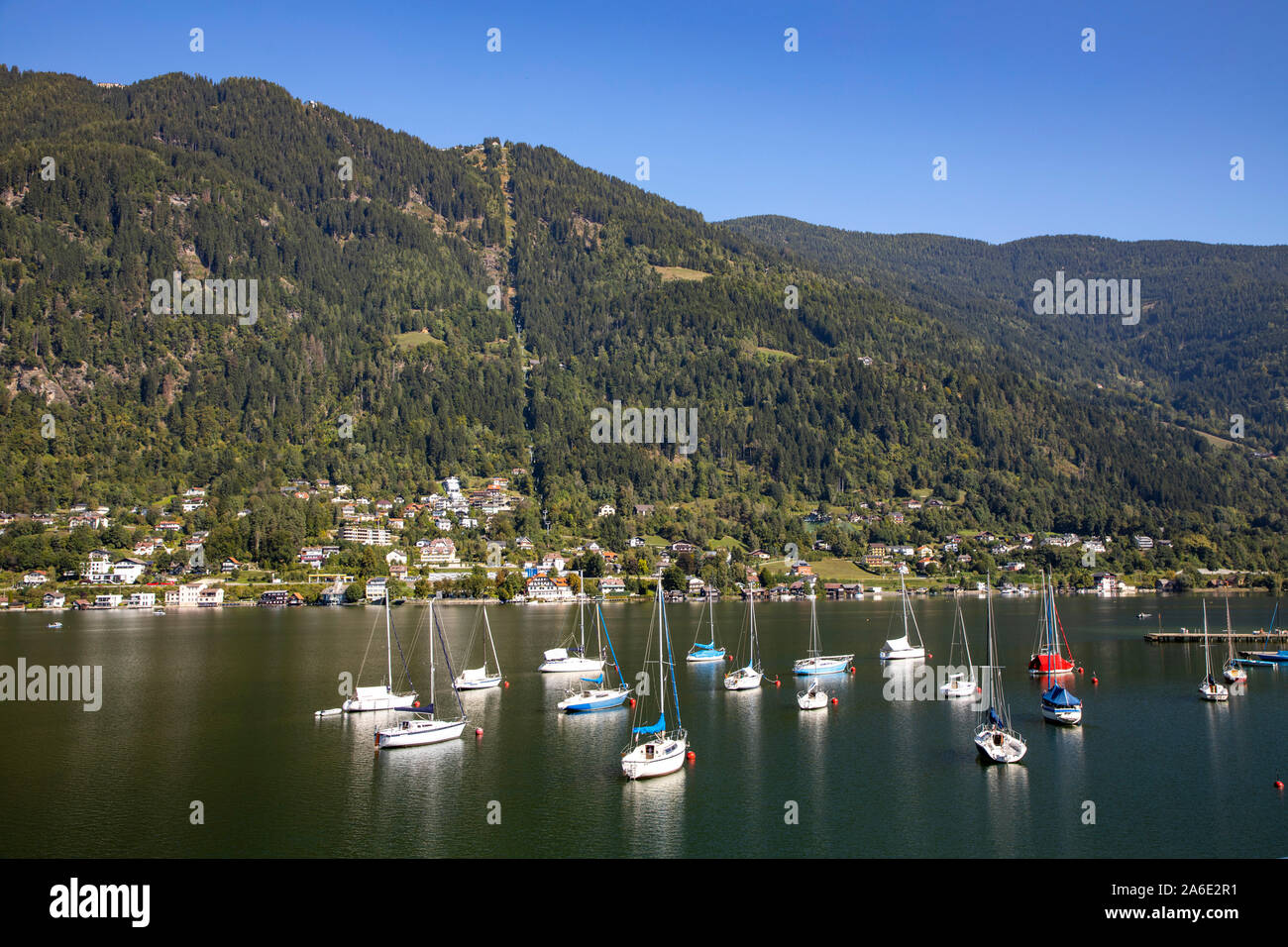 The Ossiacher Lake, in Carinthia, Austria, the village Annenheim, Gerlitzen Mountain, sailing boats, Stock Photo