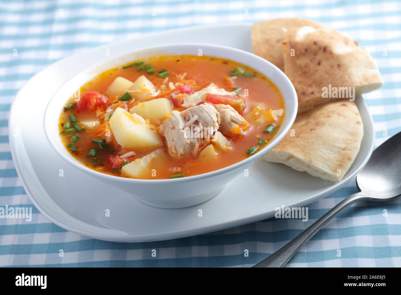 Turkish style tomato soup with chicken and vegetables Stock Photo