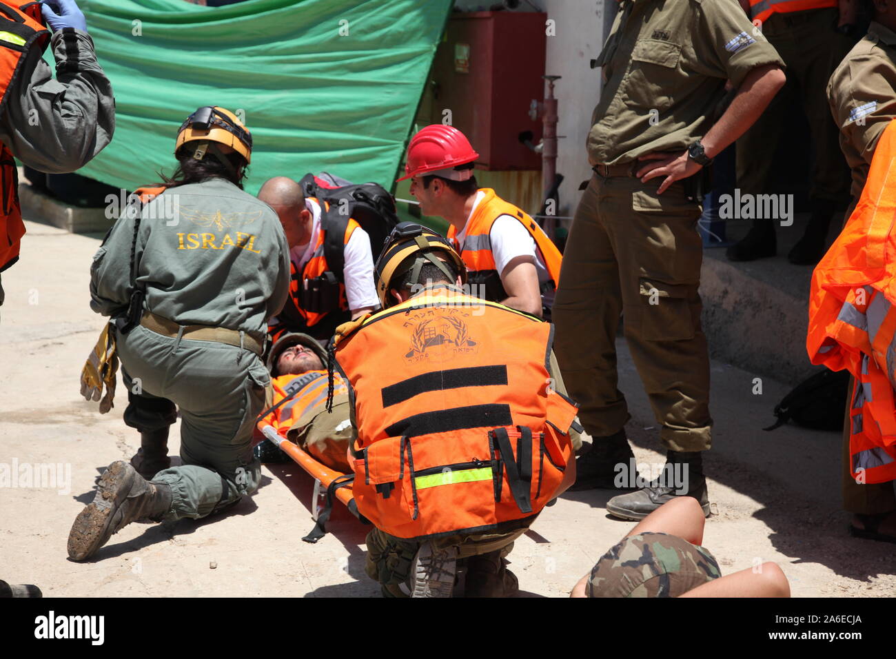 Paramedics treat rocket attack casualties in Carmel Prison, Israel, during simulation drill Turning Point 15. Emergency forces practice rescue and first aid treatment to injured Stock Photo