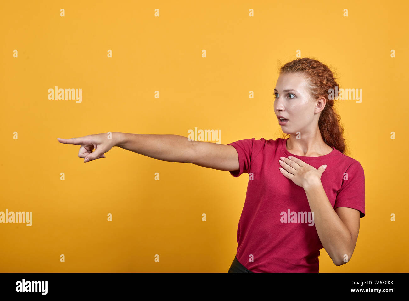 Beautiful European Woman Pointing At Right Side With Her Index Finger Stock Photo Alamy