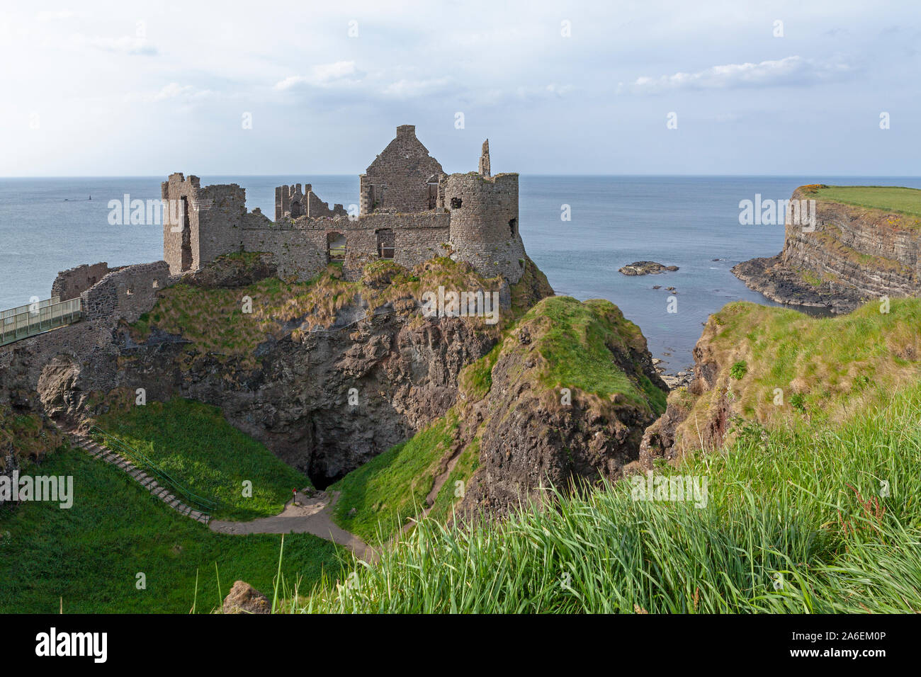 The ruins of Dunluce Castle at County Antrim in Northern Ireland. Stock Photo