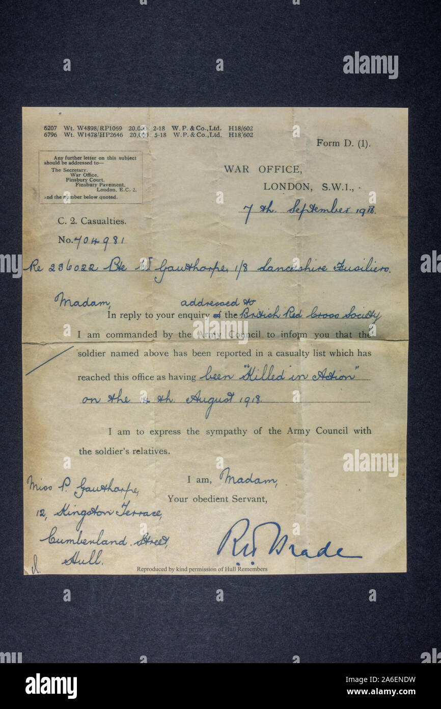 A War Office Form D (1) letter informing a family that their relative has been 'Killed in Action', a piece of replica memorabilia from the WWI era. Stock Photo