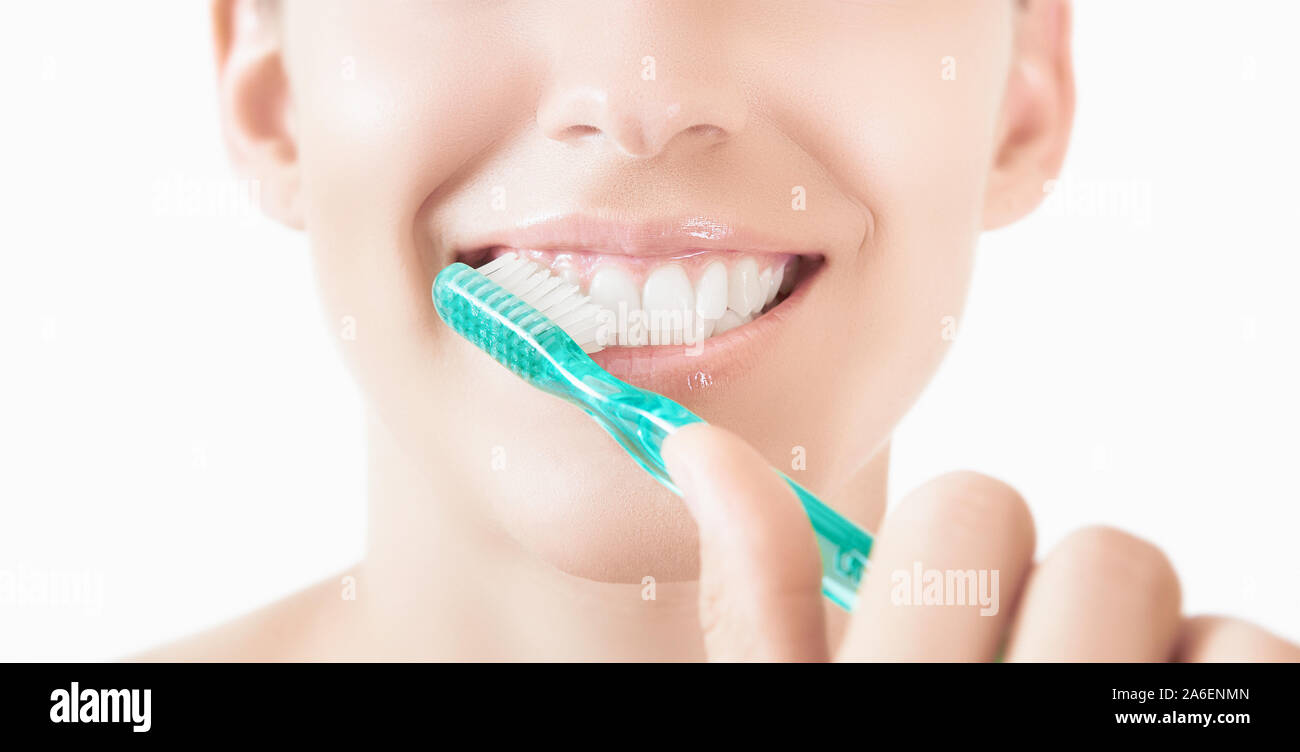 Healthy woman teeth and smile. Isolated over white background. Dental clinic. Stock Photo