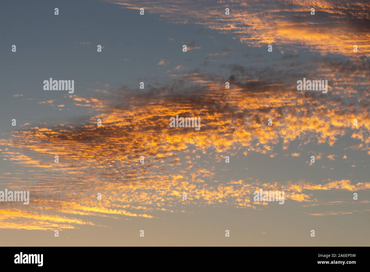 Luminous Clouds In The Evening Sky Just After Sunset Stock Photo Alamy
