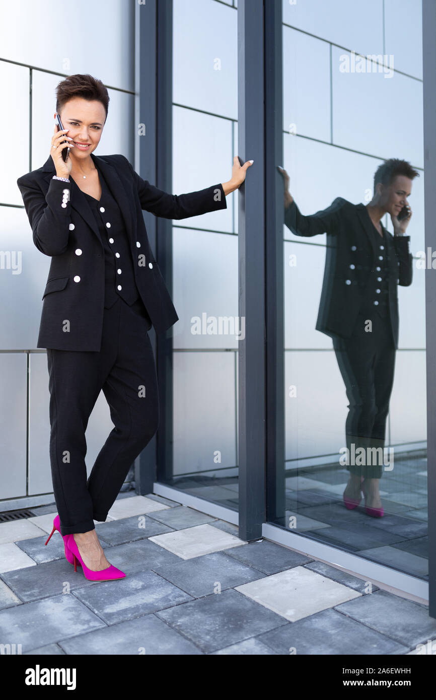 stylish business woman at work, concept of a strong and confident woman Stock Photo