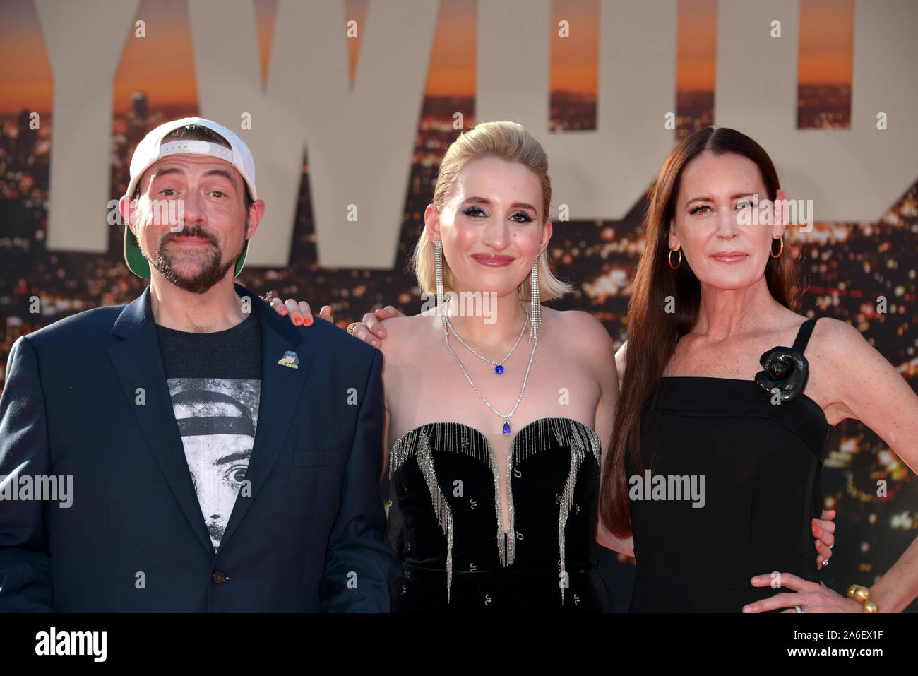 HOLLYWOOD, CALIFORNIA - JULY 22: Kevin Smith,  Harley Quinn Smith, and Jennifer Schwalbach Smith attend the Sony Pictures' 'Once Upon A Time...In Holl Stock Photo