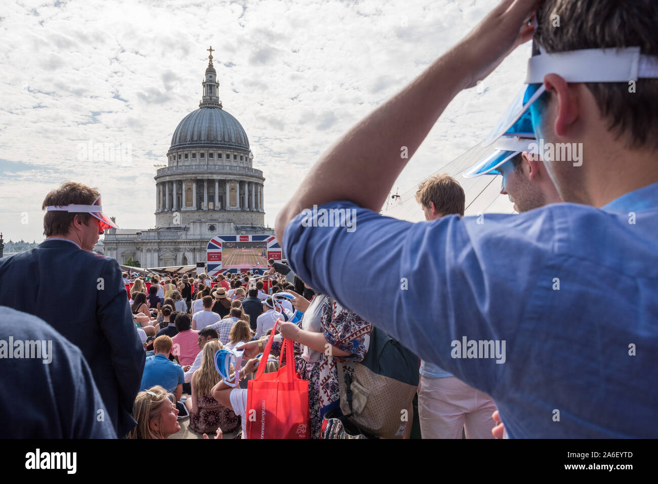 The Roof Terrace, One New Change, Nr St. Paul's Cathedral, London, UK. 10th July, 2015. Tennis fans watch the Wimbledon men's singles semi-final betwe Stock Photo