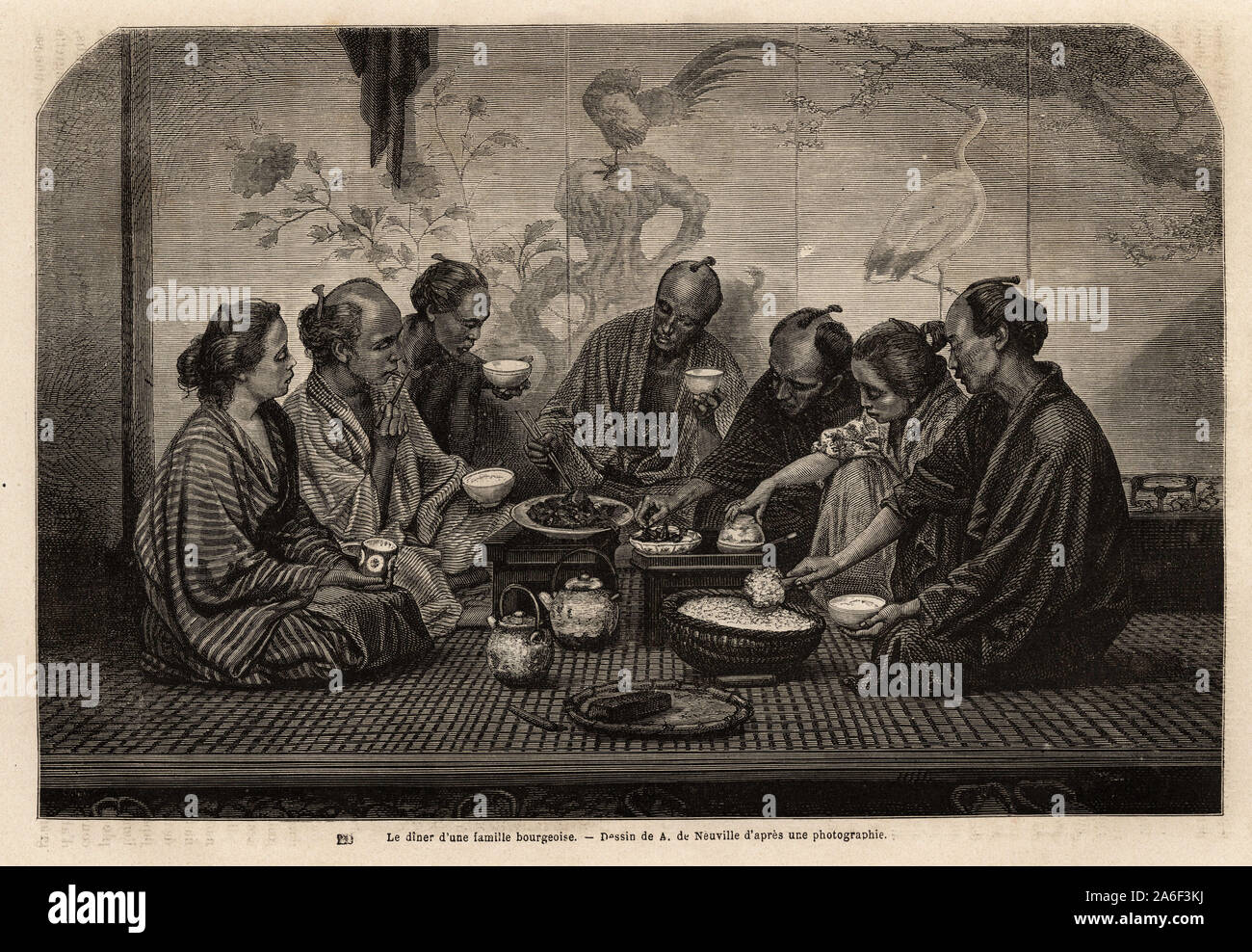 Le diner d'une famille bourgeoise, les hommes sont rassembles sur un tatami, autour de petites tables basses, ils mangent du riz dans un bol individue Stock Photo