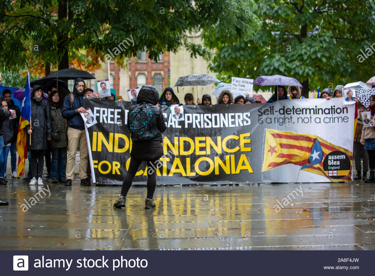 Manchester, UK, 26th October 2019. A small protest in favour of independence for Catalonia has taken place in Manchester. Holding pictures of Catalonian politicians recently jailed in Spain, the protesters listened to speeches against the actions of the Spanish government. Credit: Clearpix/Alamy Live News Credit: Clearpix/Alamy Live News Stock Photo