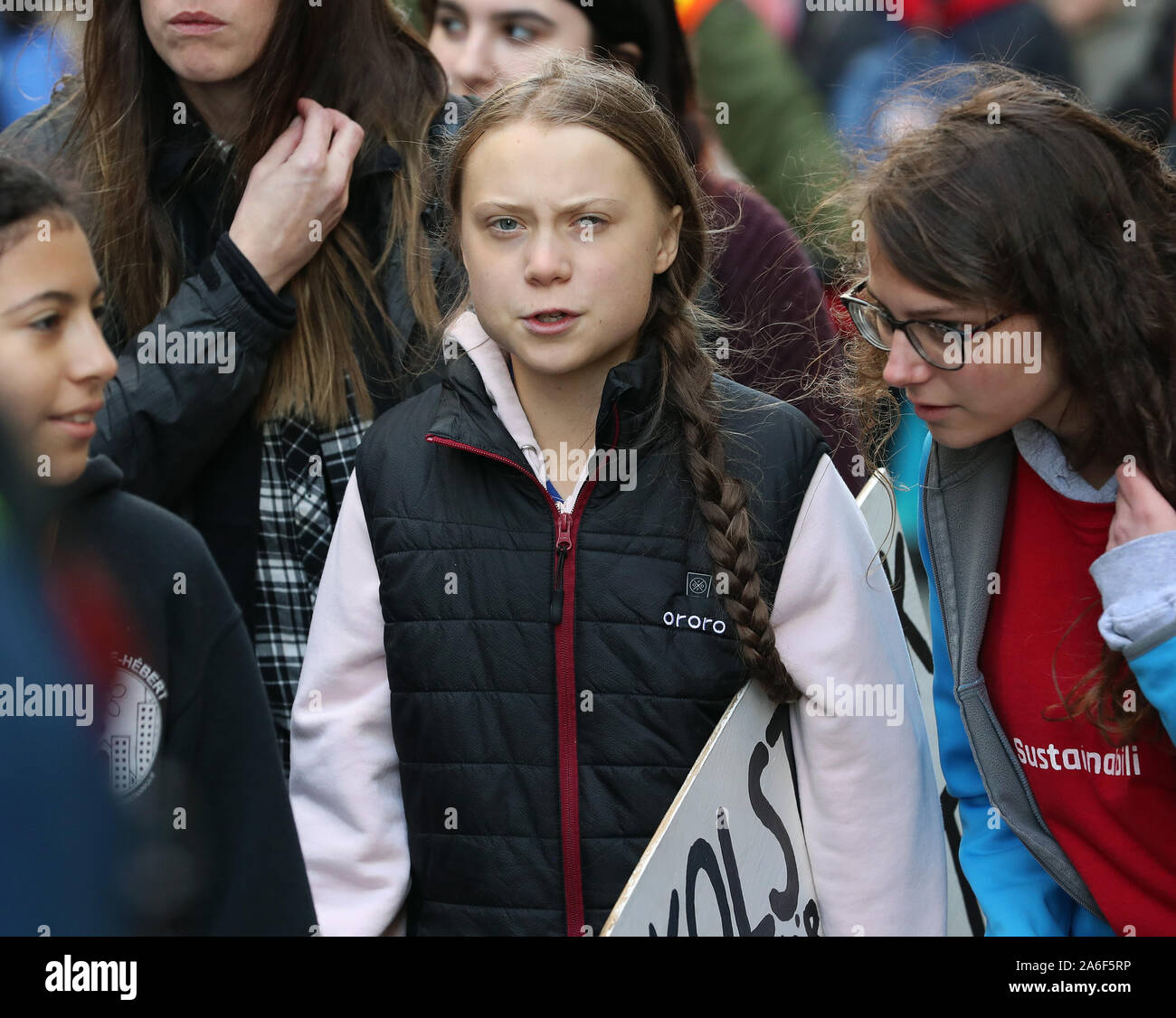 Vancouver, British Columbia, Canada, 25th October 2019. Swedish teen activist Greta Thunberg arrives for the post federal election Friday climate strike march starting and ending at the Vancouver Art Gallery in Vancouver, British Columbia on Friday, October 25, 2019. Organized by local youth-led, Sustainabiliteens, Greta and a turn out of nearly 10,000 climate activists demand action from industry and the various levels of government and are supporting the 15-youth who announced their plans to sue the federal government alleging it has contributed to climate change. Photo by Heinz Ruckemann/UP Stock Photo