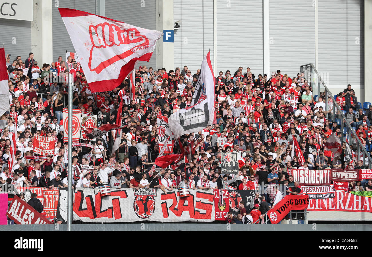 Paderborn, Germany. 26th Oct, 2019. Soccer: Bundesliga, SC Paderborn 07 -  Fortuna Düsseldorf, 9th matchday in the Benteler Arena. Fans of Düsseldorf  wave their flags. Credit: Friso Gentsch/dpa - IMPORTANT NOTE: In