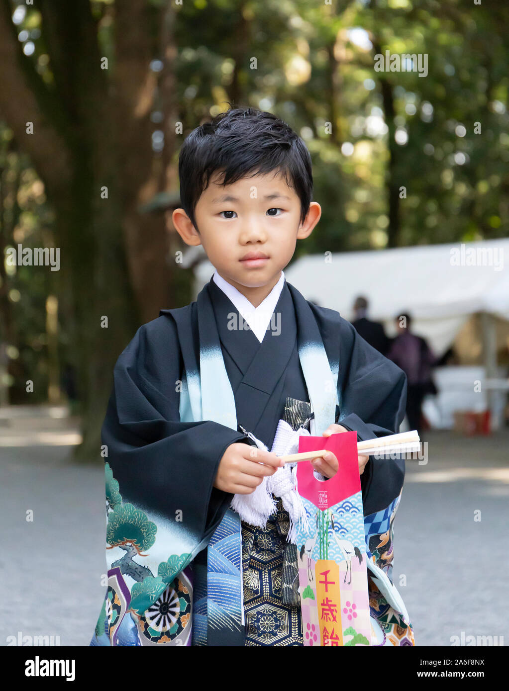 Tokyo, Japan - October 31st, 2018: A japanese boy in a traditional outfit near the Meiji temple in Tokyo, Japan Stock Photo